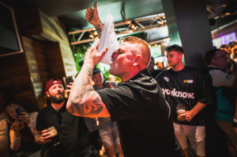 State of Origin Fan doinga shooey at Belushi's