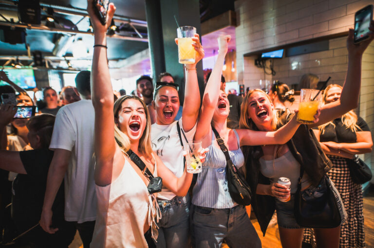 Fans celebrating the AFL grand Final in Belushi's Bar.