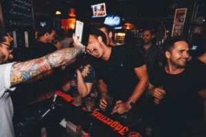 An image of a bartender serving Jagermeister to Belushi's customers.