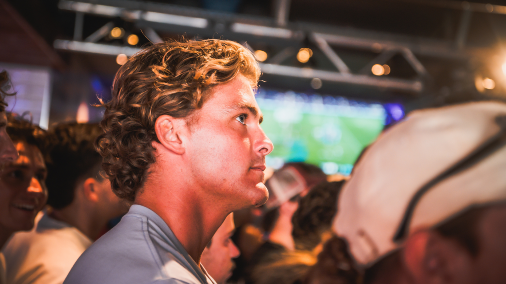 A customer enjoying the autumn internationals at a Belushi's bar