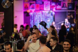 An image of customers seated at a Belushi's bar