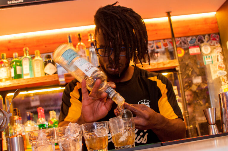 An image of a Belushi's bartender making drinks