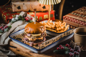 Belushi's sports and late nights bars' Christmas specials, Bad Santa burger with sausage patty and cranberry.