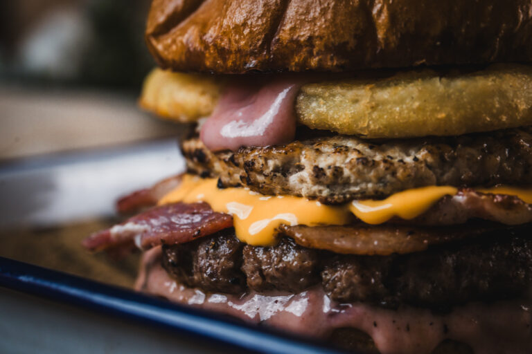 Belushi's sports and late nights bars' Christmas specials, Bad Santa burger with sausage patty and cranberry.