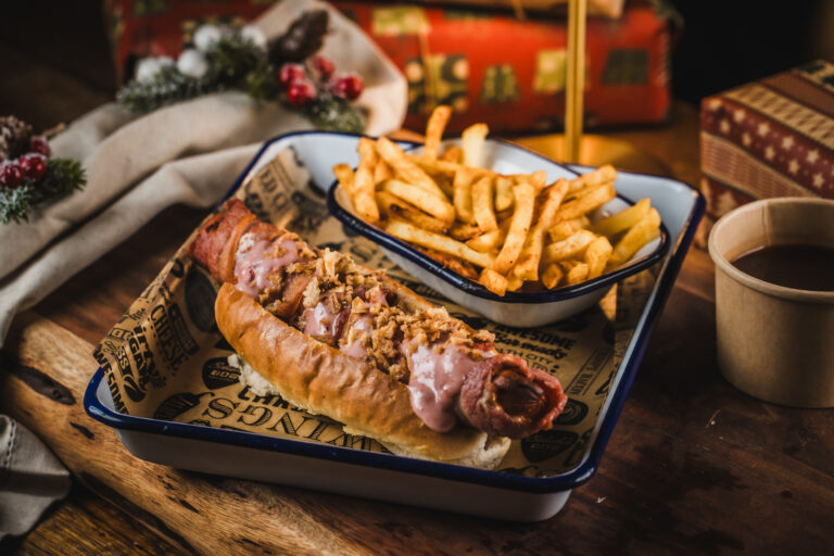 Belushi's sports and late nights bars' Christmas specials, hot dog wrapped in bacon.